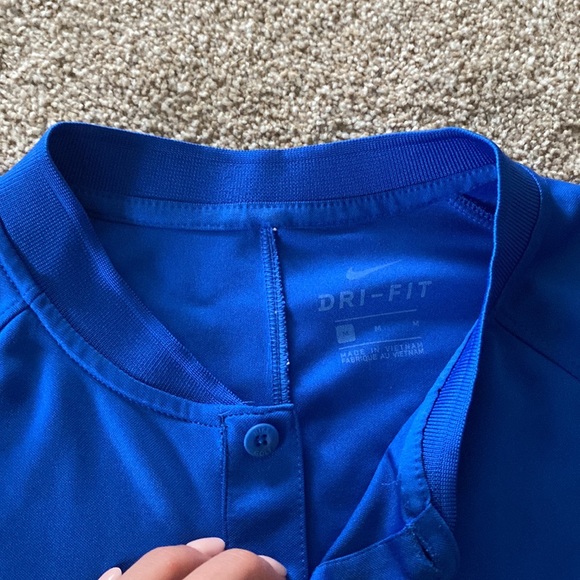 Blue nike golf shirt. Minor snags shown in picture. - Picture 2 of 3